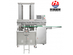 Automatic tray arranging machine